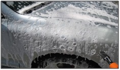 Image of a car being washed
